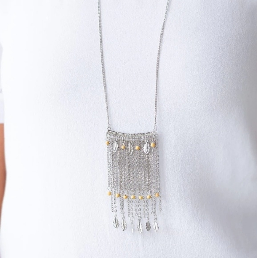 Long silver feather and yellow necklace